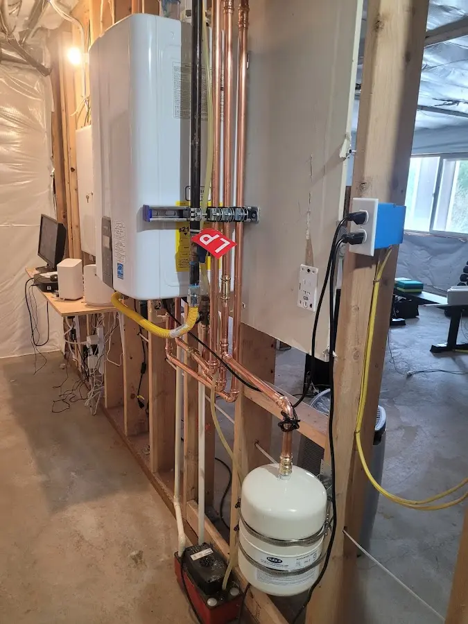 Licensed plumber repairing a kitchen sink in Williamstown
